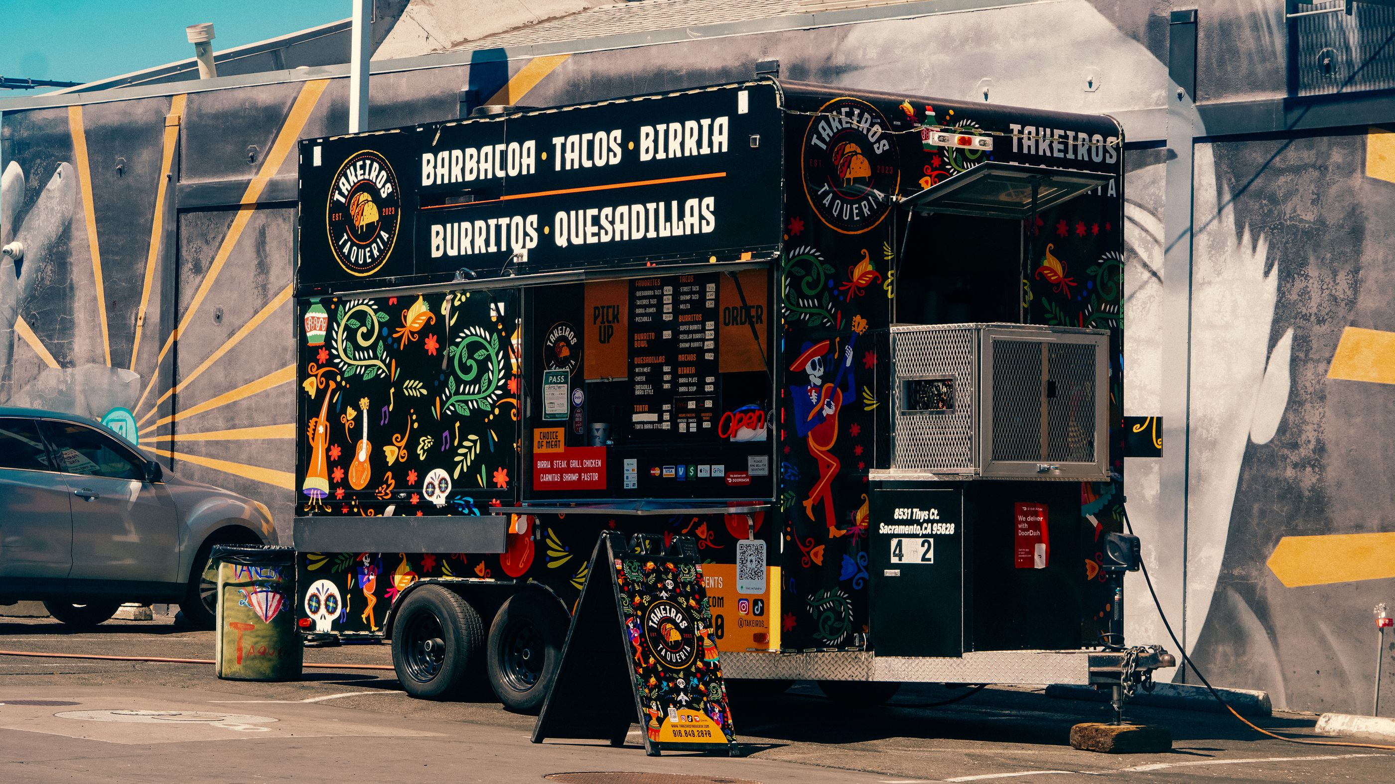Colorful Mexican food truck in an urban setting — the food trailer that deserves the same quality as the five-star restaurant.